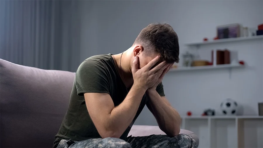 a man with ptsd in therapy
