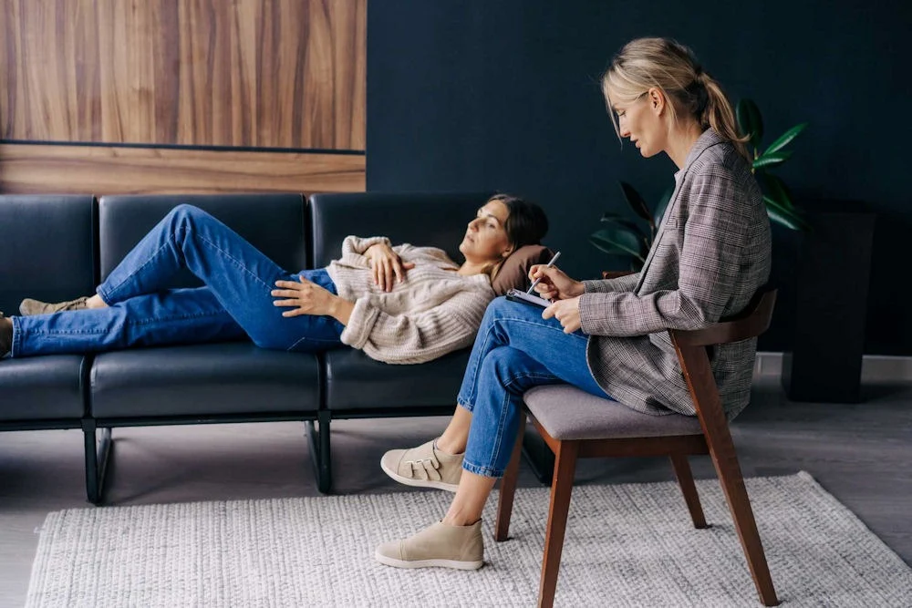 Therapy session supporting emotional healing and recovery activities that promote self-reflection and mental wellness.