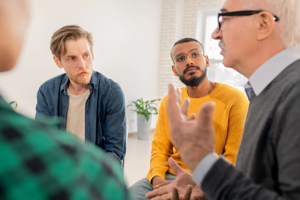 a-group-of-men-in-therapy