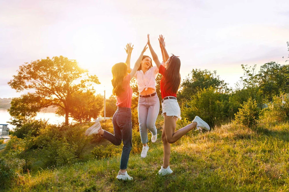 group of girls discussing summer mental health