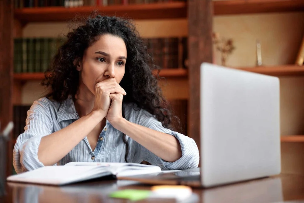 Woman attending a telehealth session