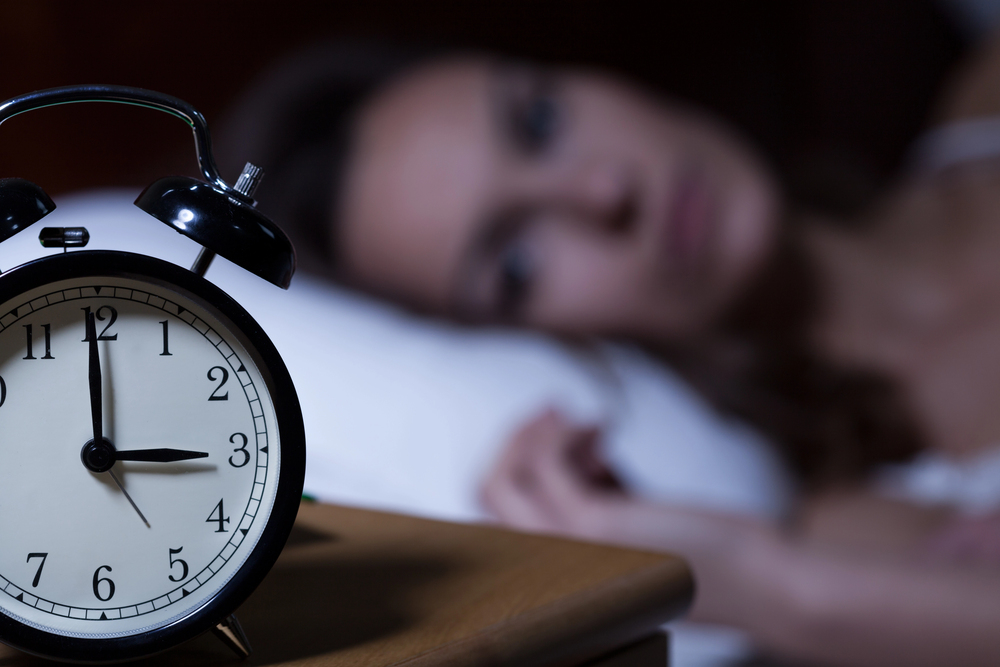 woman getting trouble sleeping because of weed insomnia