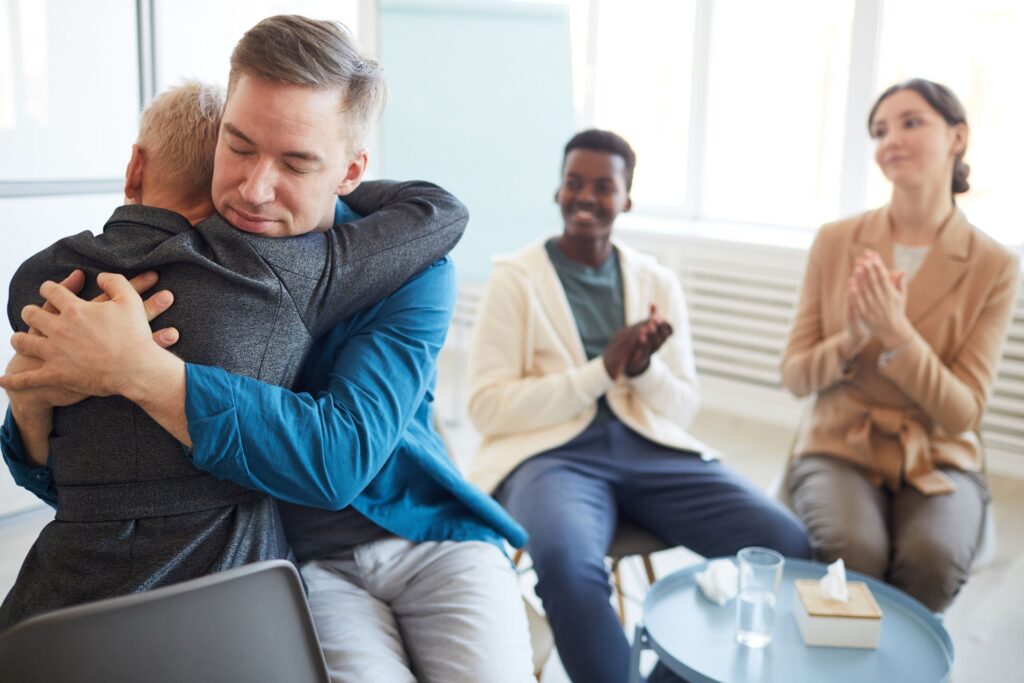 family staging an intervention to support loved one through recovery process