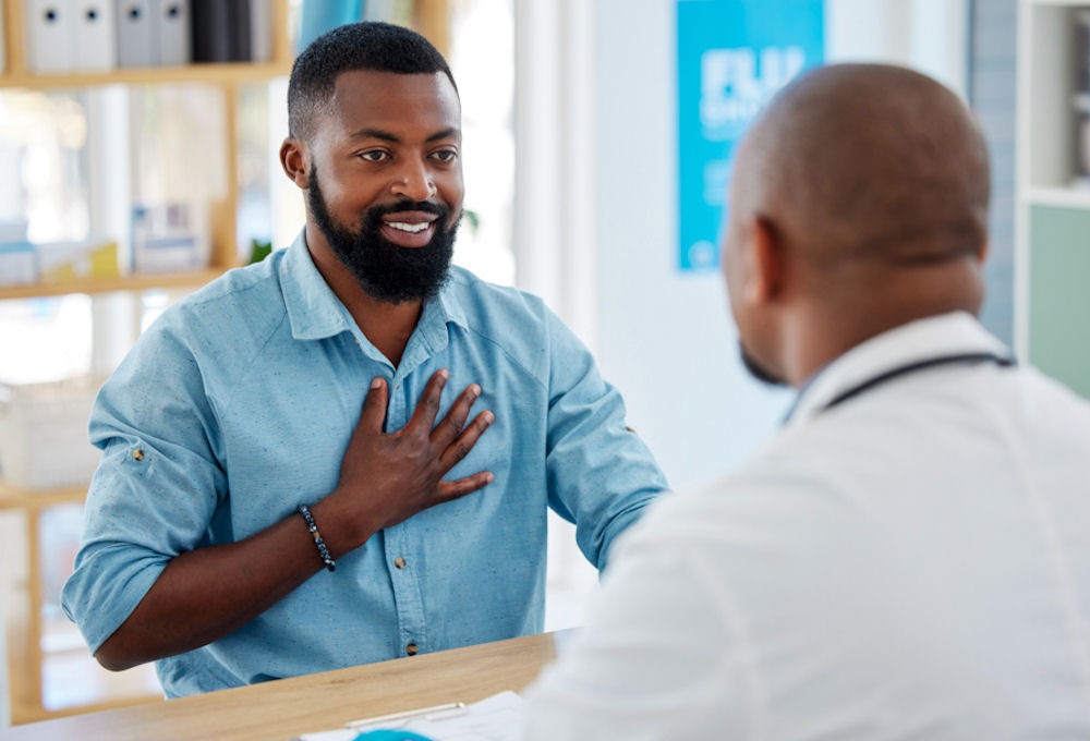 a man speaking to a doctor