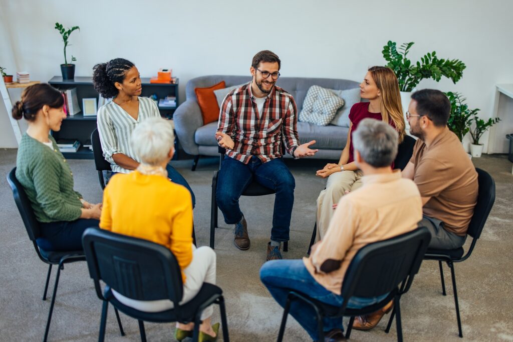 a group of individuals in therapy