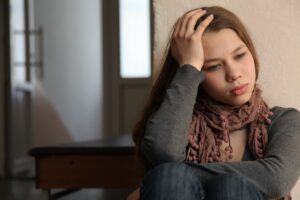 Teen girl facing emotional struggles and substance use, supported by cocaine rehab care