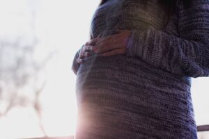 Pregnant woman receiving specialized addiction rehab care in Washington State
