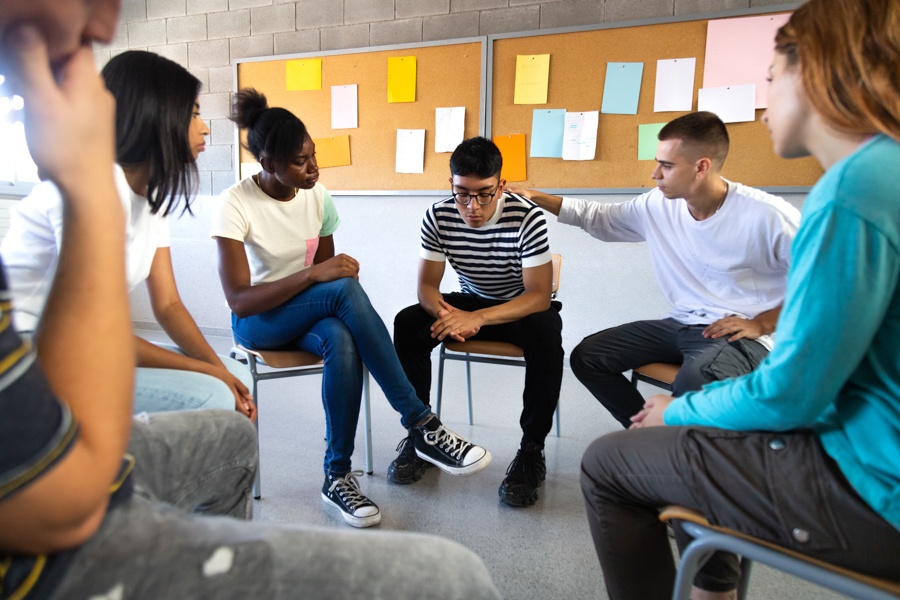 Group discussion for young adults about sobriety and support
